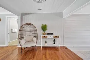 a view of a livingroom with furniture and wooden floor