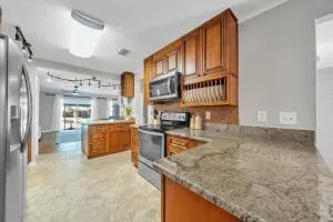 a view of a dining room with furniture and window