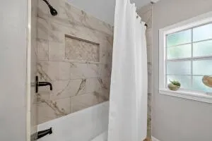 a bathroom with a bathtub