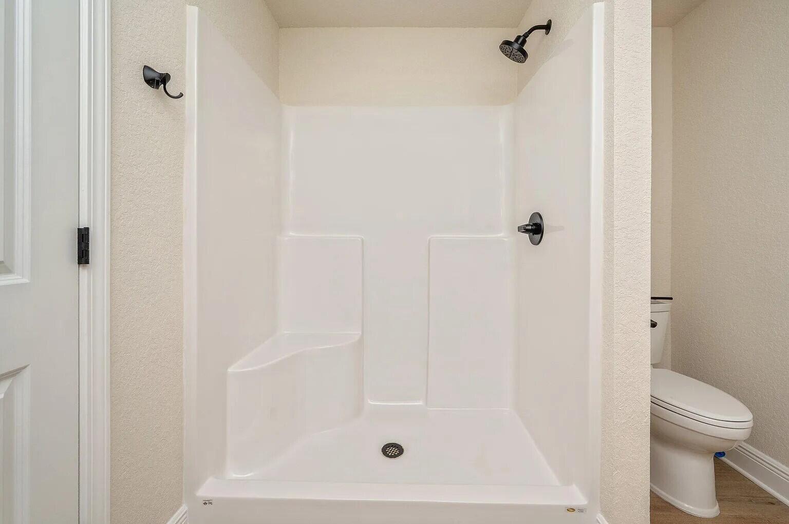 693 Bowers Avenue East Crestview, FL 32539 - Photo 21 of 27 a bathroom with a shower and a toilet