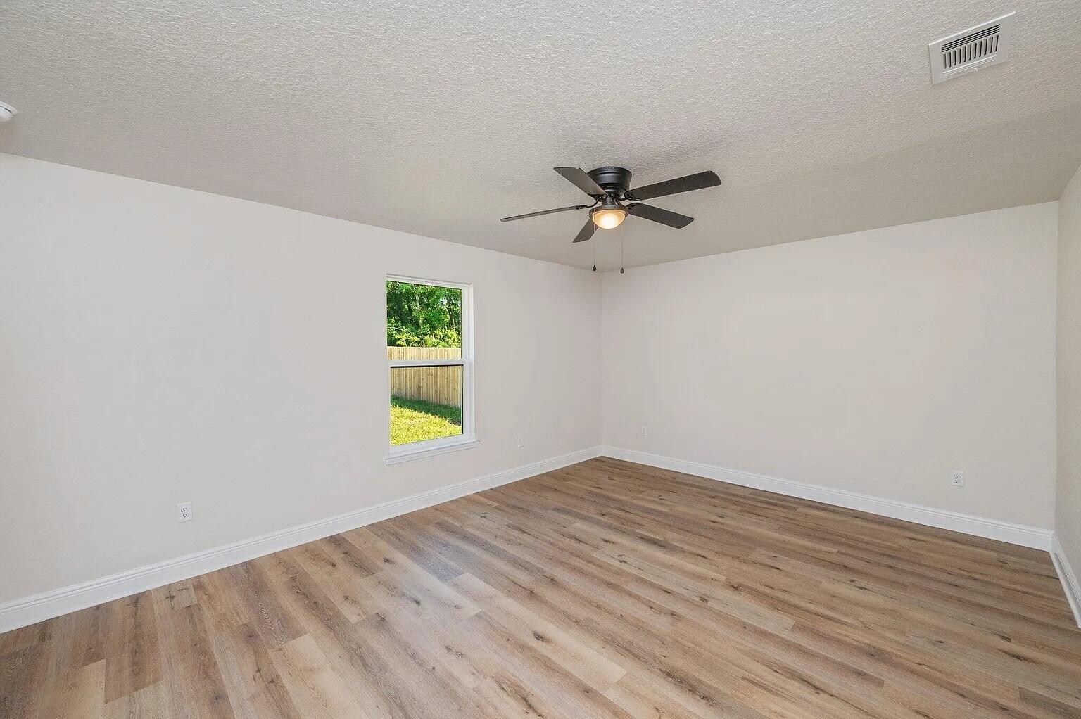693 Bowers Avenue East Crestview, FL 32539 - Photo 24 of 27 a view of an empty room with a window