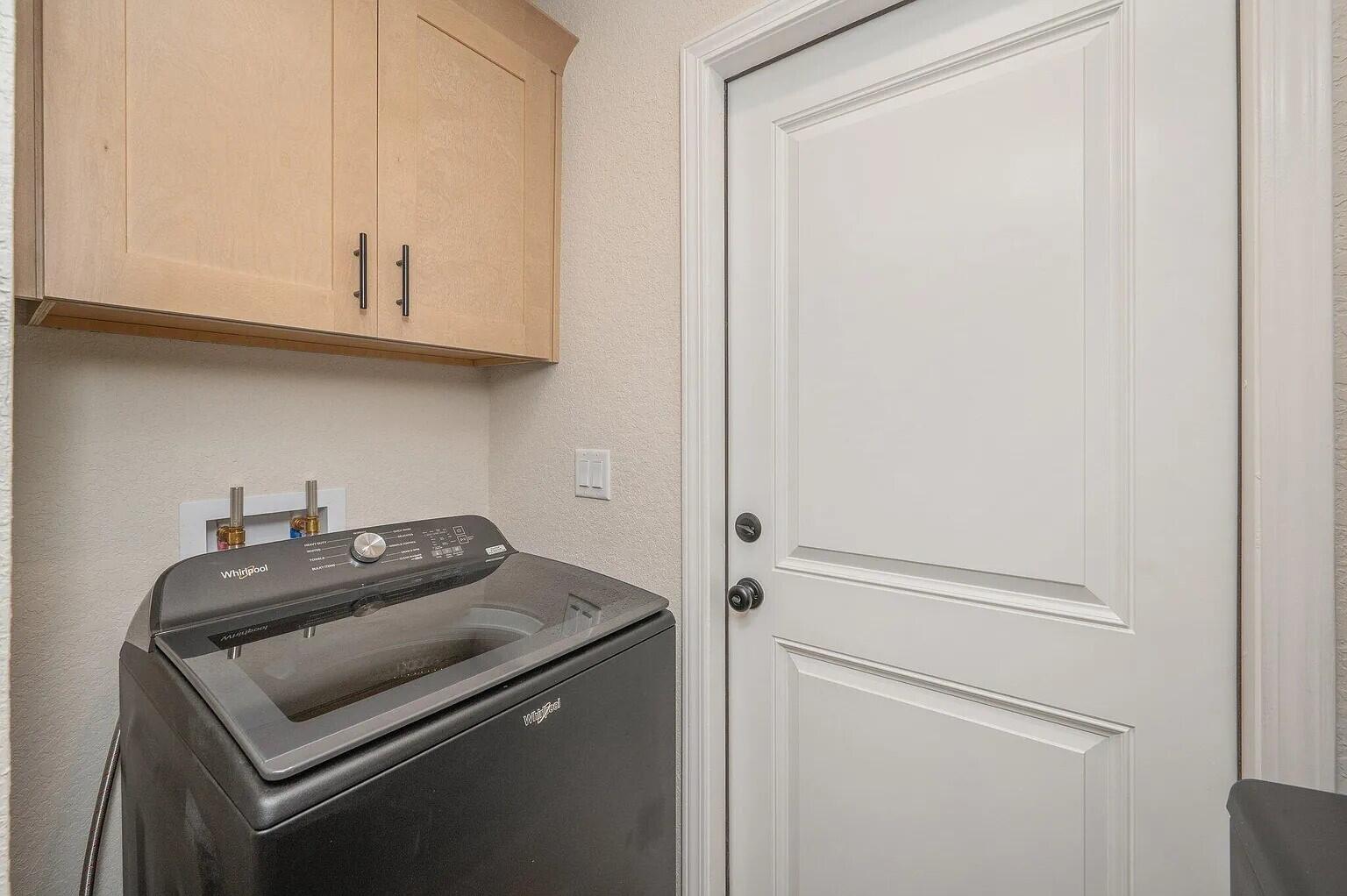 693 Bowers Avenue East Crestview, FL 32539 - Photo 26 of 27 a utility room with dryer and washer