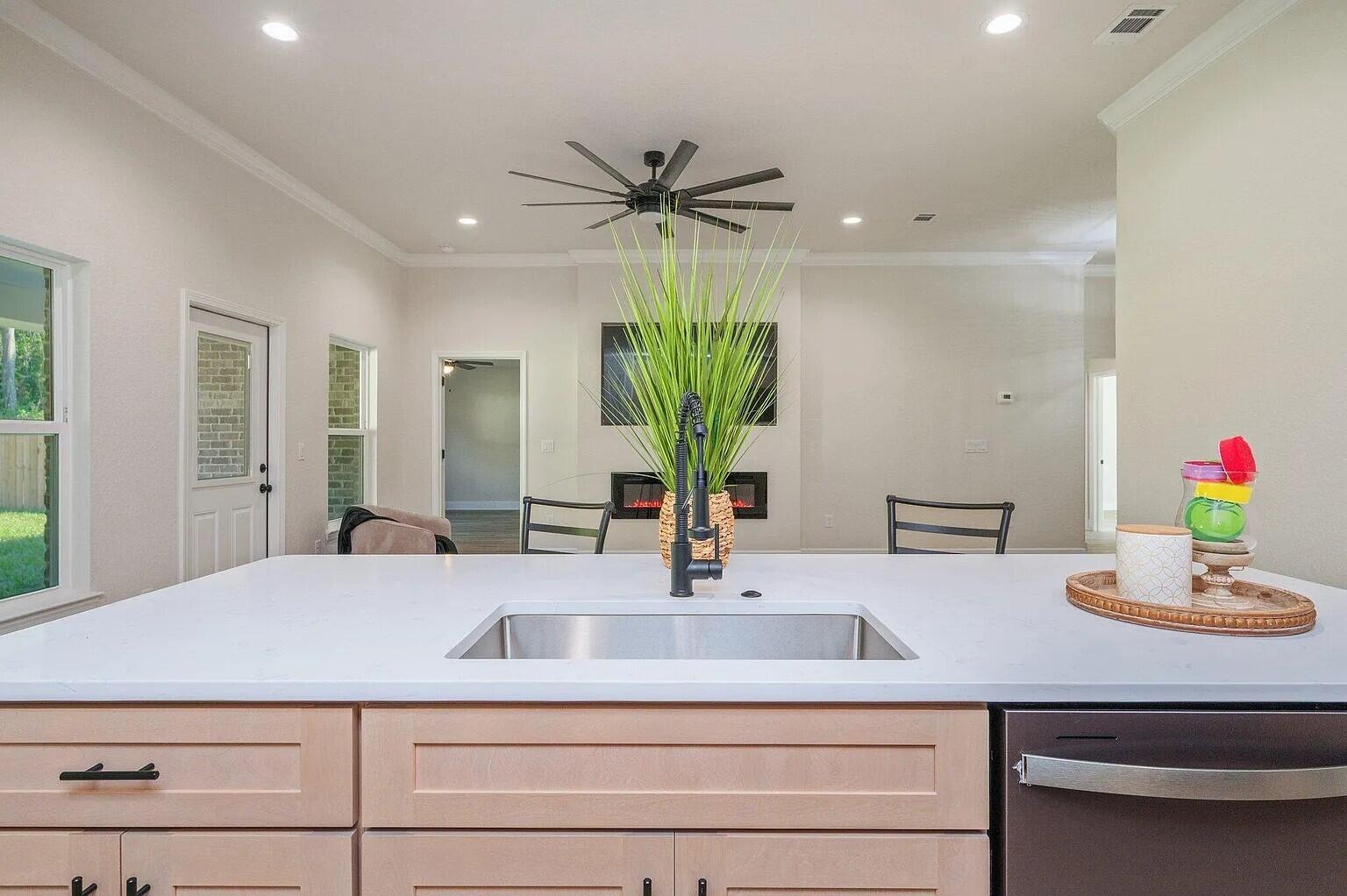 693 Bowers Avenue East Crestview, FL 32539 - Photo 9 of 27 a bathroom with a double vanity sink and a mirror