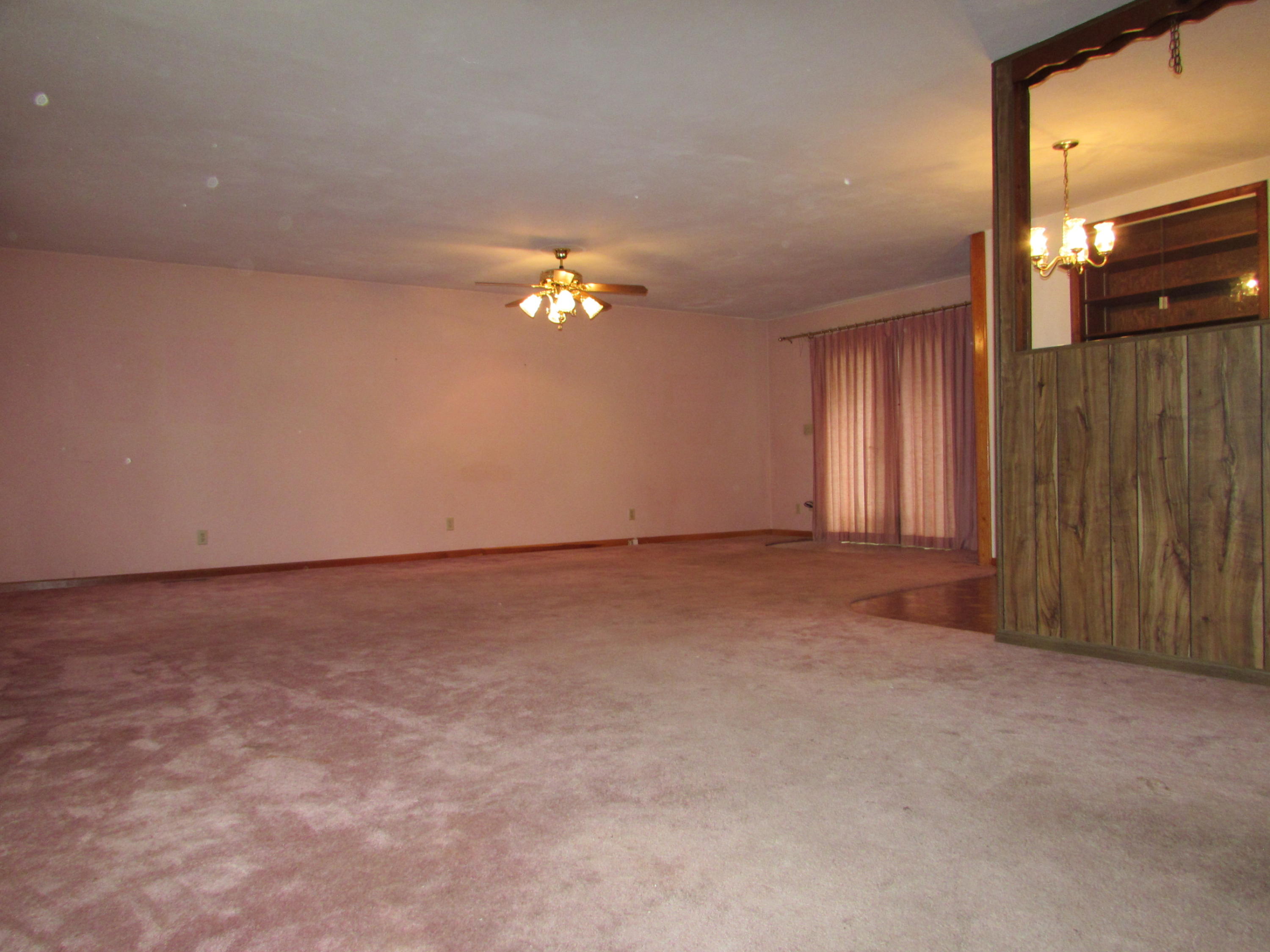 529 Olney Road Vinton, VA 24179 - Photo 4 of 13 a view of an empty room with a window