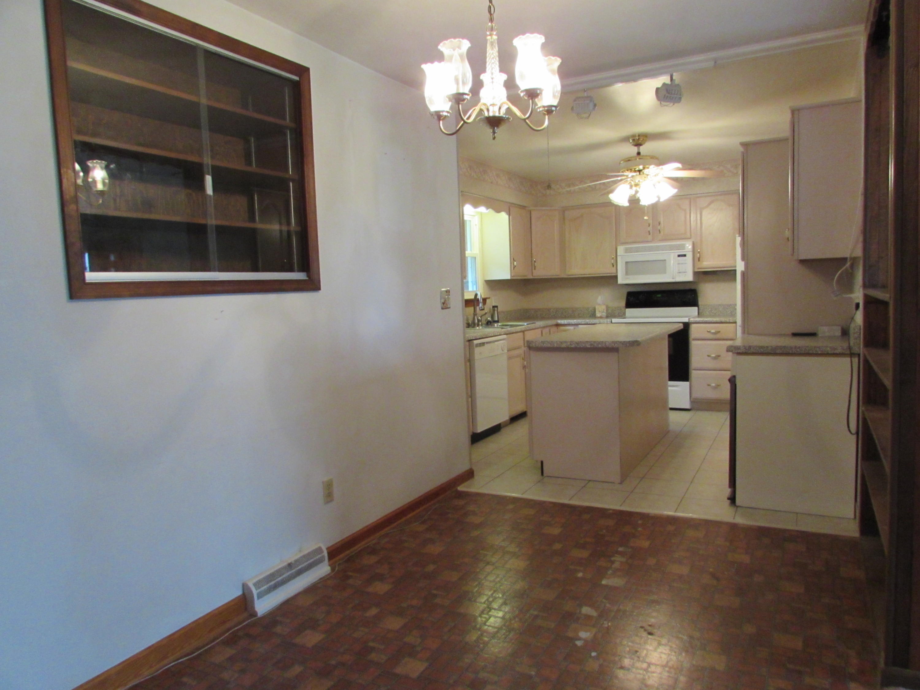 529 Olney Road Vinton, VA 24179 - Photo 6 of 13 a view of a kitchen with a sink and dishwasher in kitchen