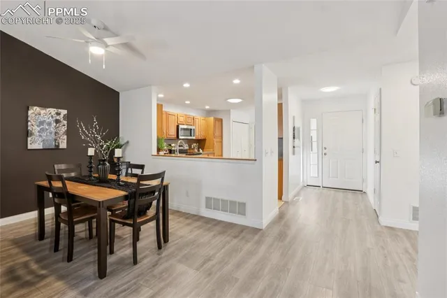 a view of a dining room with furniture