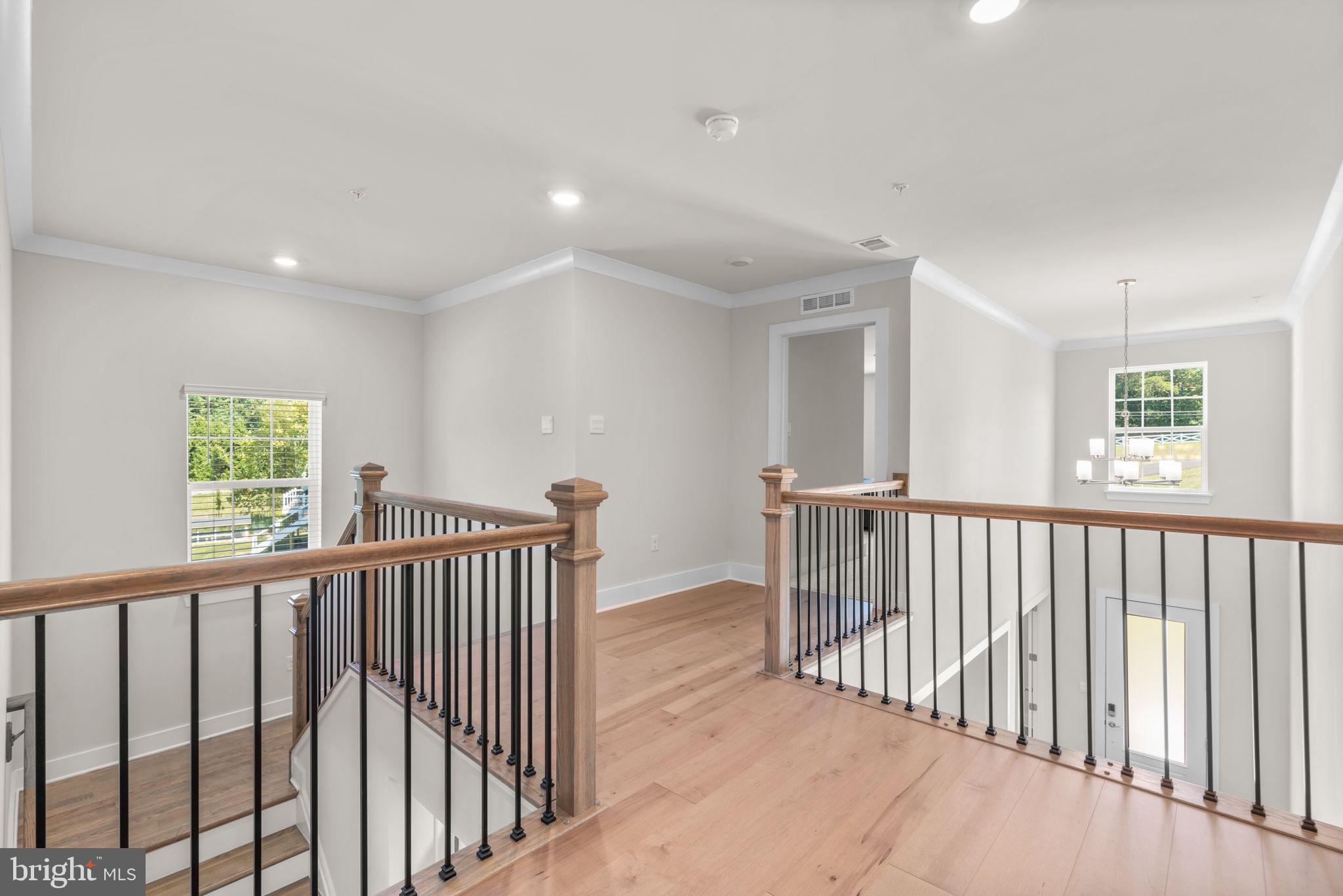 21708 Woodfield Road Gaithersburg, MD 20882 - Photo 23 of 76 a view of hallway with stairs