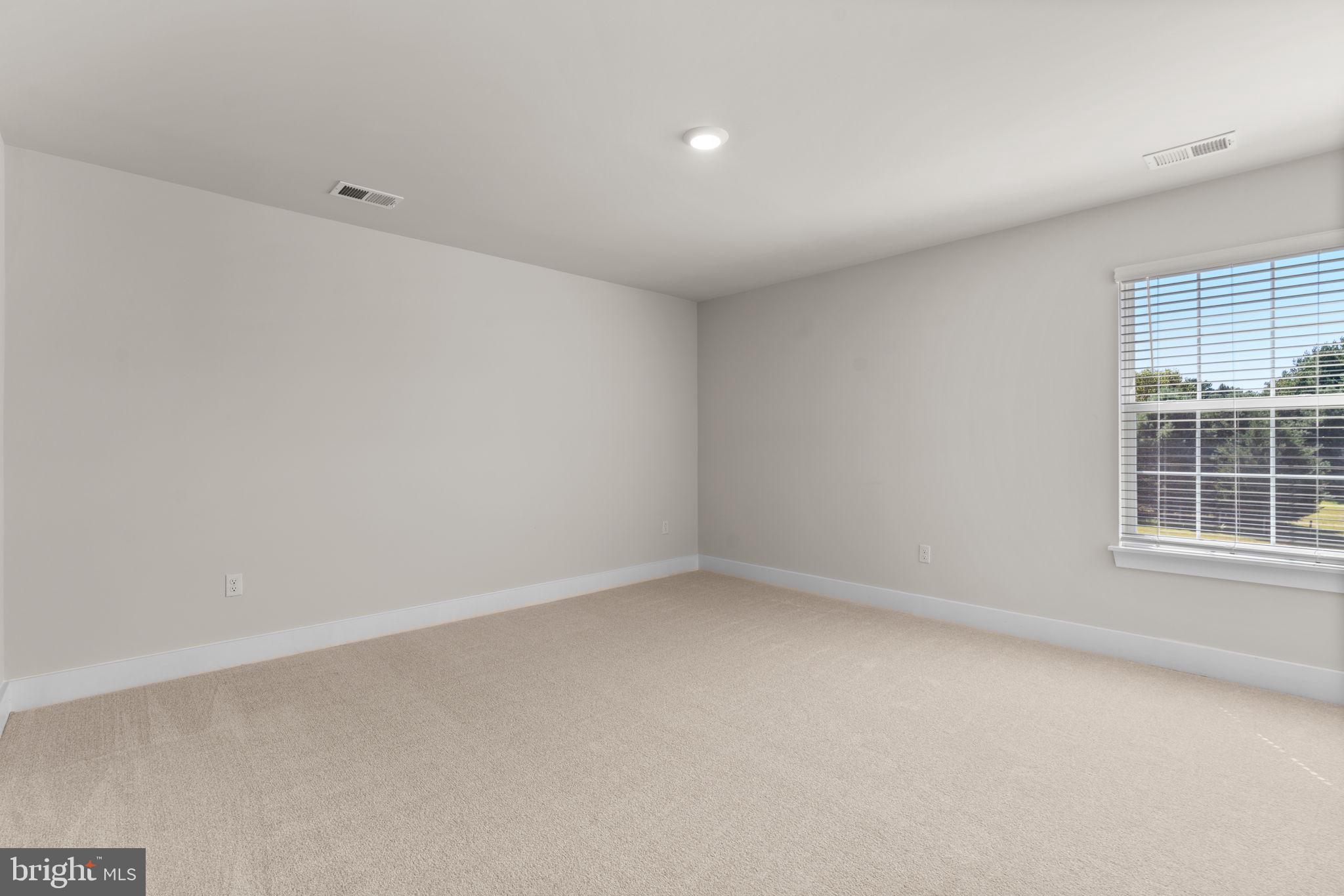 21708 Woodfield Road Gaithersburg, MD 20882 - Photo 41 of 76 an empty room with a window