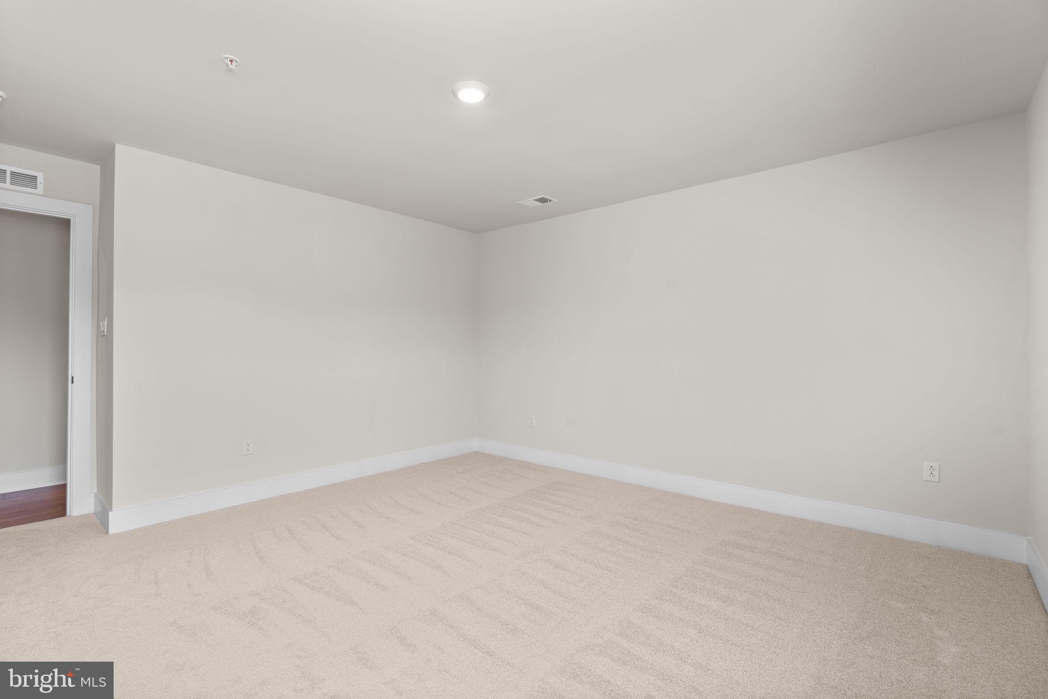 21708 Woodfield Road Gaithersburg, MD 20882 - Photo 42 of 76 a view of an empty room