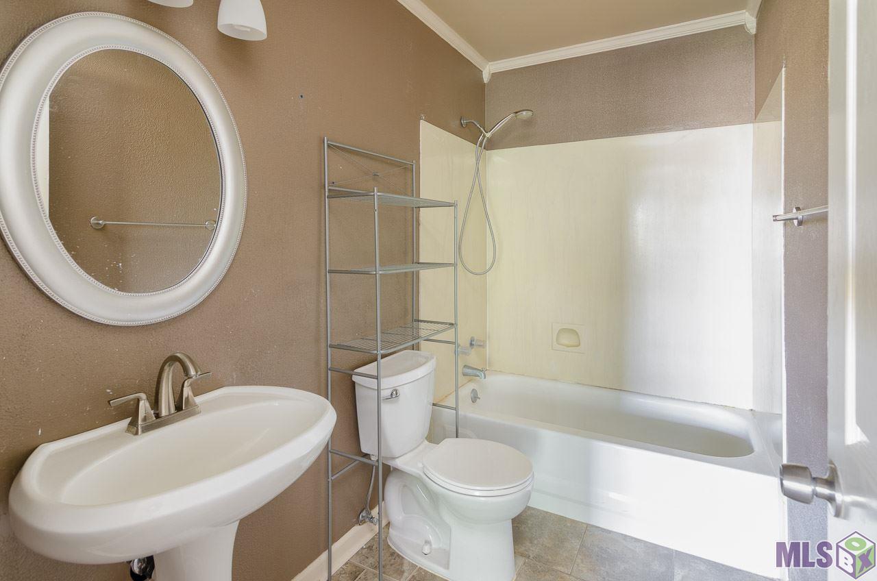 12416 South Harrells Ferry Road, Unit 4A Baton Rouge, LA 70816 - Photo 2 of 13 Master Bathroom
