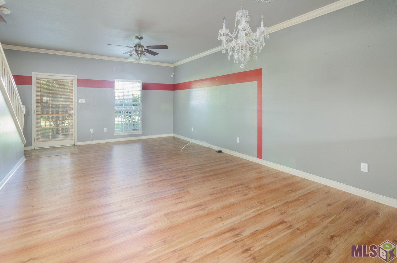 12416 South Harrells Ferry Road, Unit 4A Baton Rouge, LA 70816 - Photo 7 of 13 Open Living and Dining Area