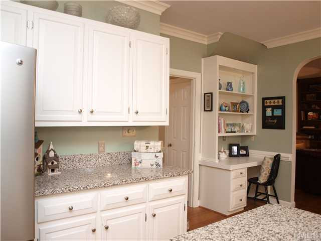 8305 Mourning Dove Road Raleigh, NC 27615 - Photo 7 of 24 Built-in desk area in Kitchen