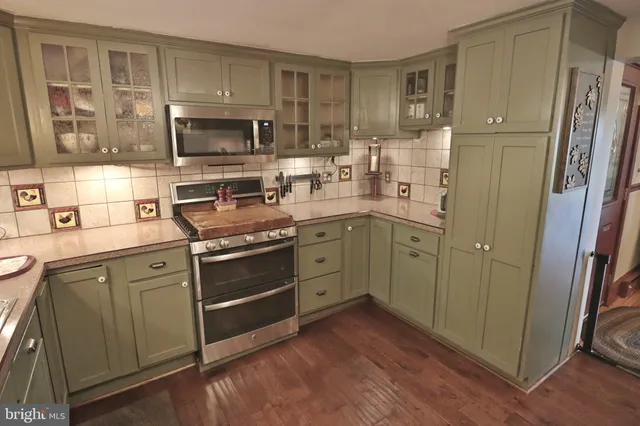 a view of a backyard with sitting area