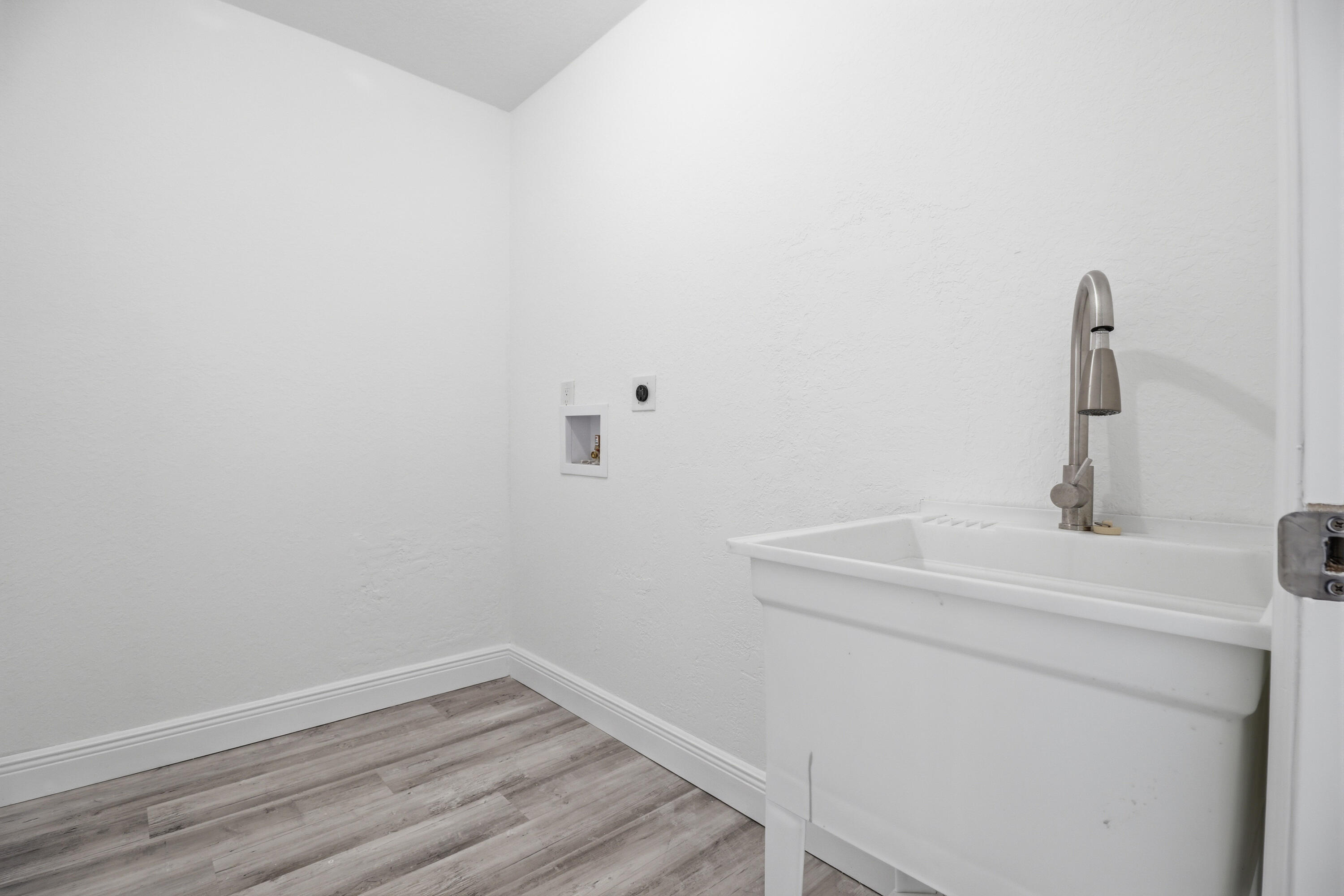 2805 Southeast Carroll Street Stuart, FL 34997 - Photo 14 of 21 a bathroom with a sink and vanity