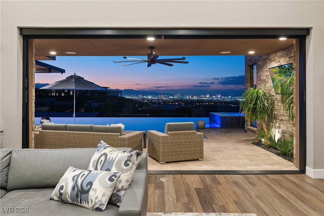 2224 Ledge Rock Lane Henderson, NV 89052 - Photo 23 of 66 Living room pocket door for 180 strip and valley views
