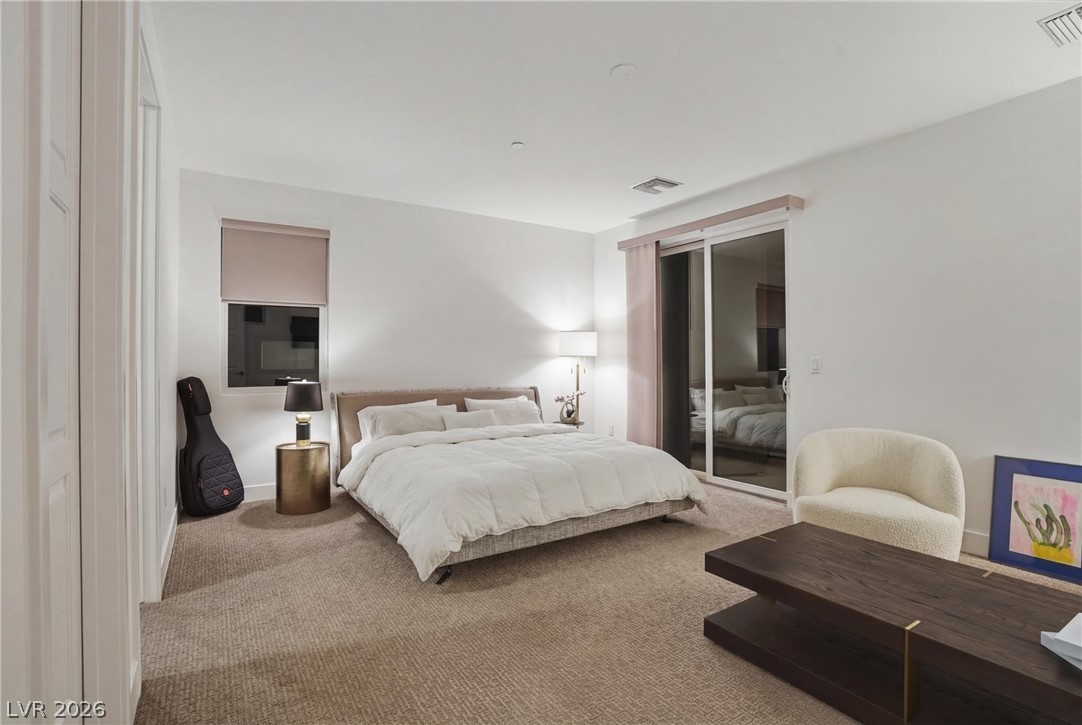 2224 Ledge Rock Lane Henderson, NV 89052 - Photo 38 of 66 Upstairs guest bedroom with ensuite bath, and balcony with mountain views