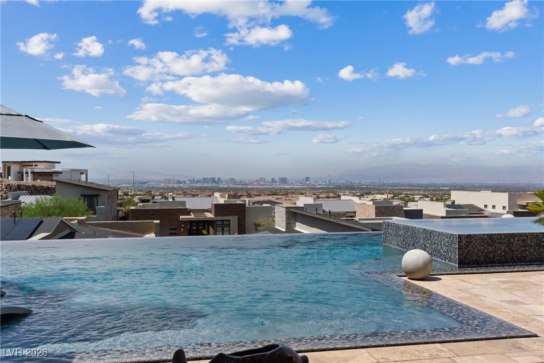 2224 Ledge Rock Lane Henderson, NV 89052 - Photo 51 of 66 Infinity edge pool and spa with unobstructed city and valley views