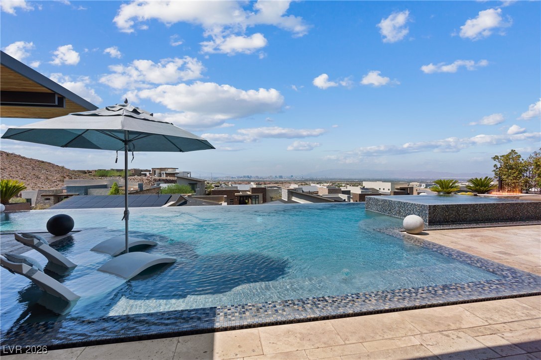 2224 Ledge Rock Lane Henderson, NV 89052 - Photo 52 of 66 Infinity edge pool and spa with unobstructed city and valley views