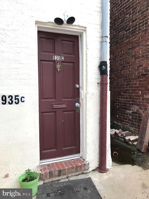 935 South Charles Street, Unit C Baltimore, MD 21230 - Photo 4 of 46 entrance door to the second floor apt