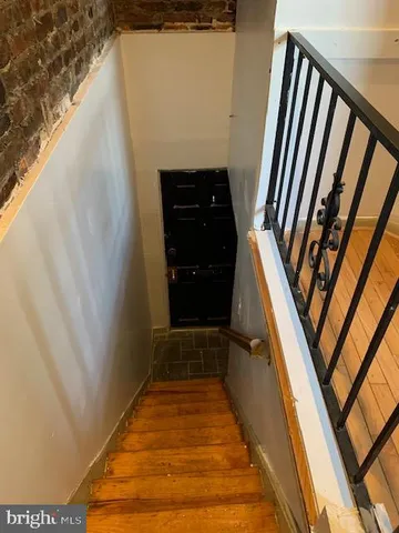 a view of stairs and furniture