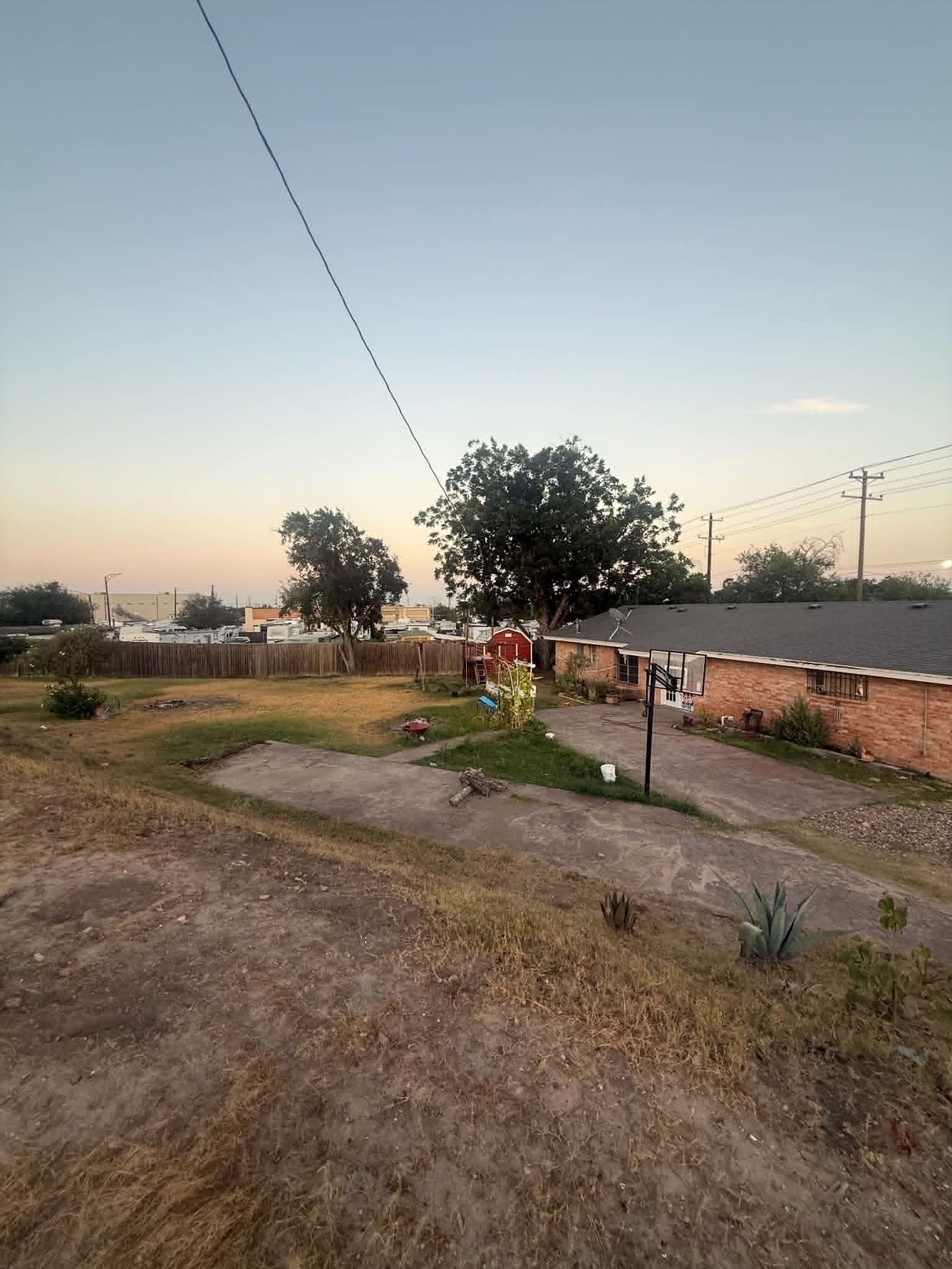 2 South Mile Road Mission, TX 78573 - Photo 5 of 16 back area of home with large space R.V. connections as well