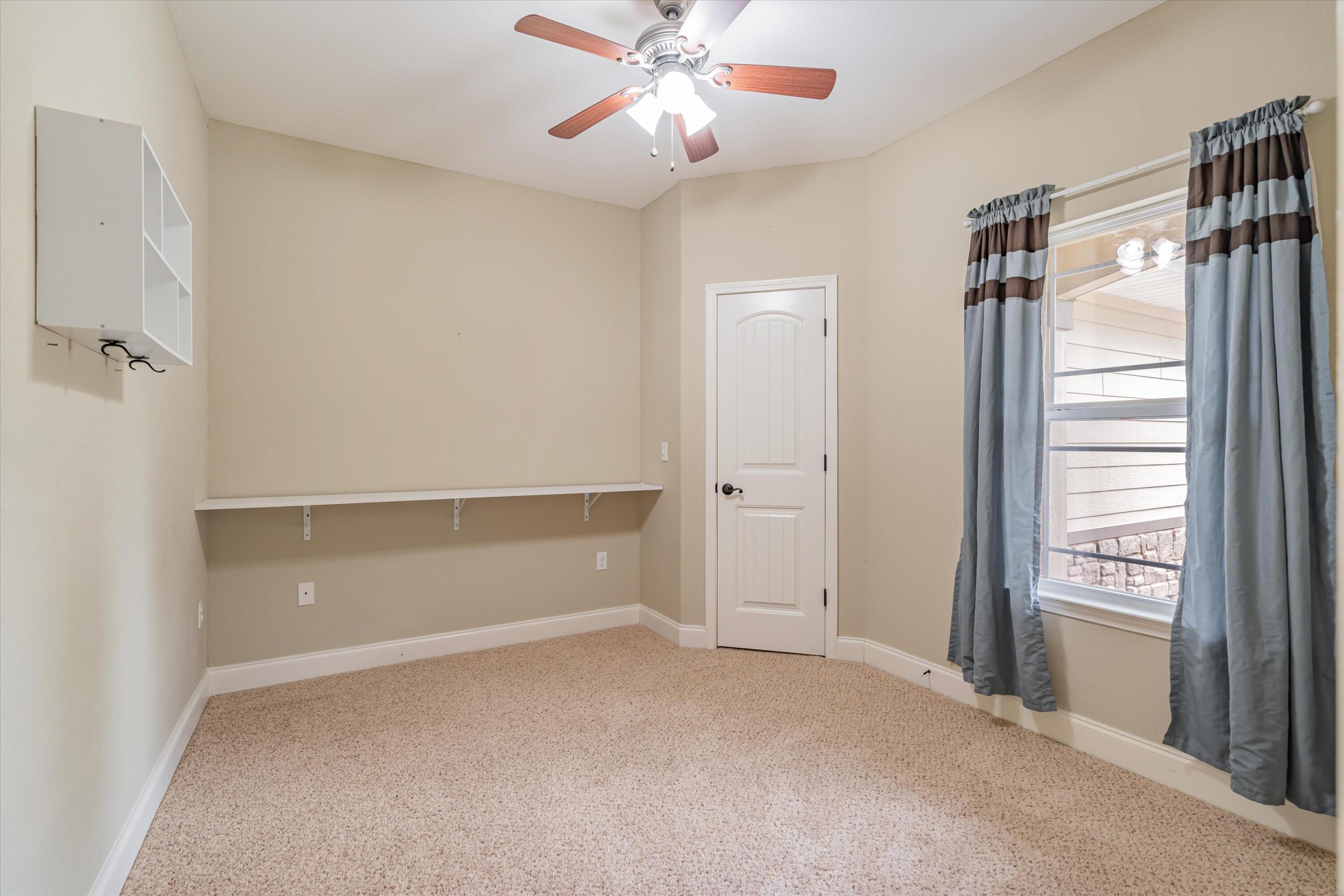 4529 Hermosa Road Crestview, FL 32539 - Photo 7 of 49 a view of an empty room and window