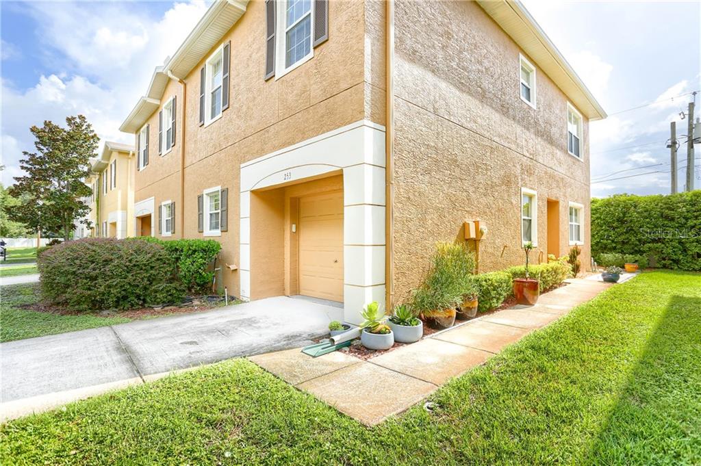 253 Ashley Court Dunedin, FL 34698 - Photo 1 of 1 Private side entry or enter through oversized 1 car garage