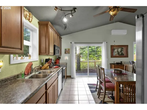 a kitchen that has a cabinets counter space and a sink