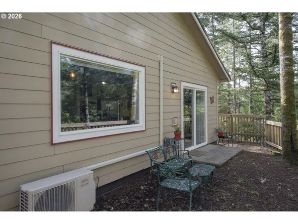 a view of backyard with porch