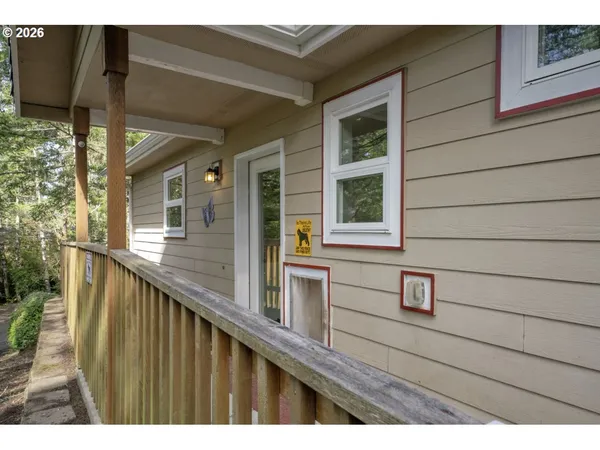 a view of balcony with furniture