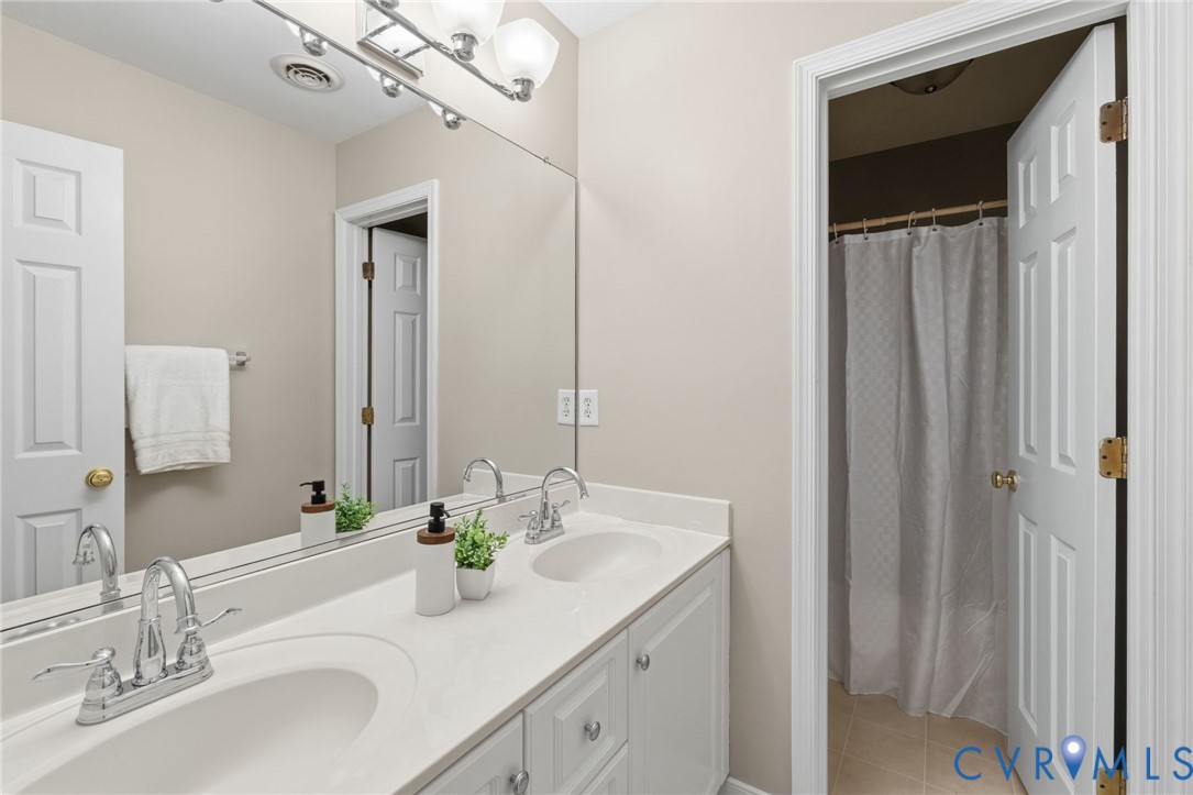 15919 Hampton Summit Drive Chesterfield, VA 23832 - Photo 27 of 42 Hall Bathroom with dual sinks, separate tub/shower