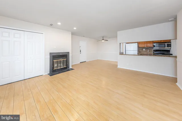 a bedroom with a bed and a television