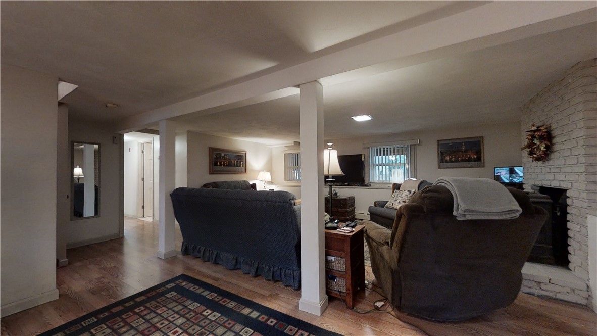 115 Town Farm Road Coventry, RI 02816 - Photo 23 of 36 L/L/ living room w/ wood stove