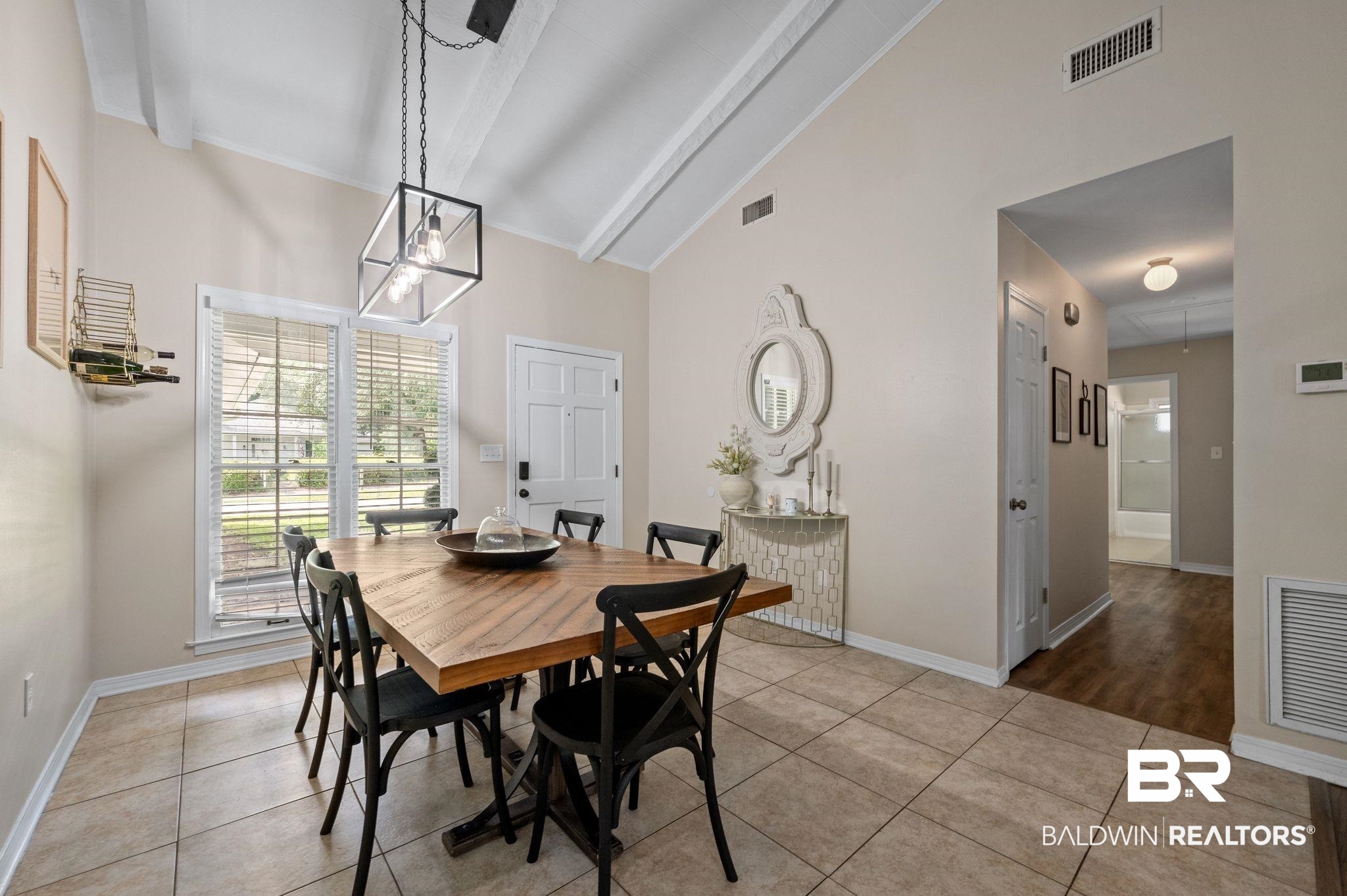 110 Ferncliff Circle Daphne, AL 36526 - Photo 7 of 40 Dining area featuring high vaulted ceiling, light tile patterned floors, beam ceiling, and baseboards
