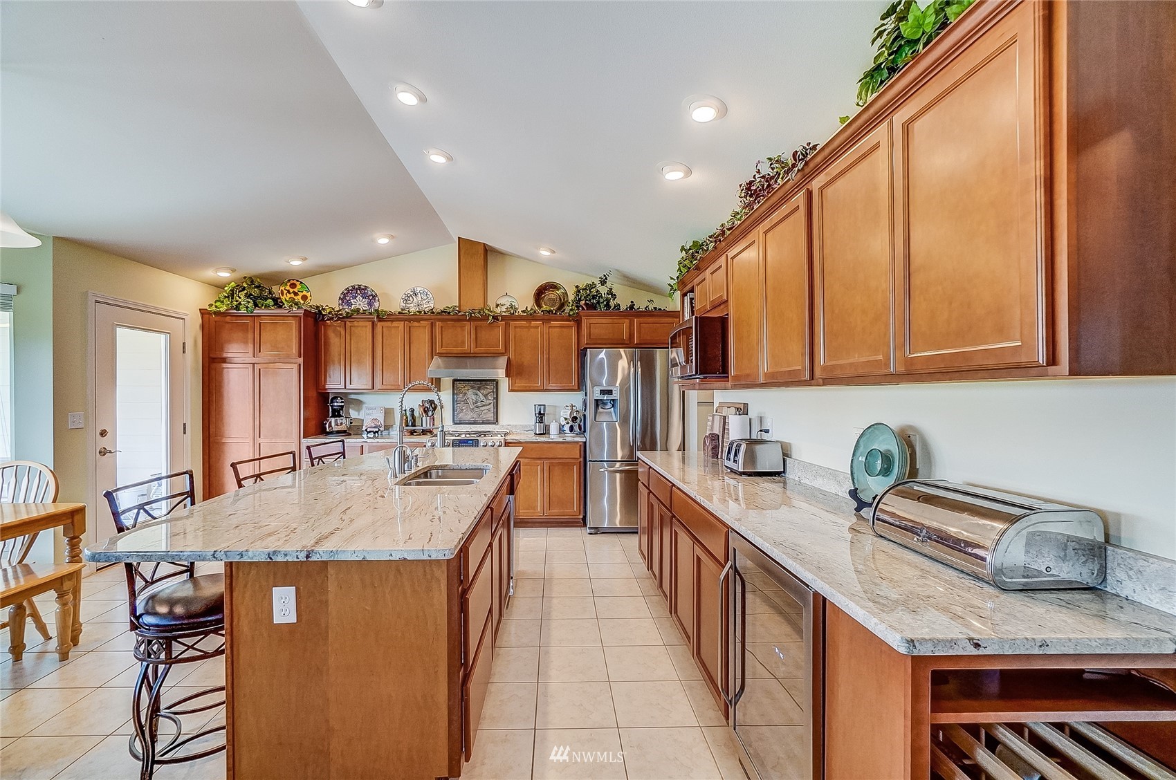 18039 Wild Violet Lane Southwest Rochester, WA 98579 - Photo 19 of 40 a kitchen with granite countertop lots of counter top space