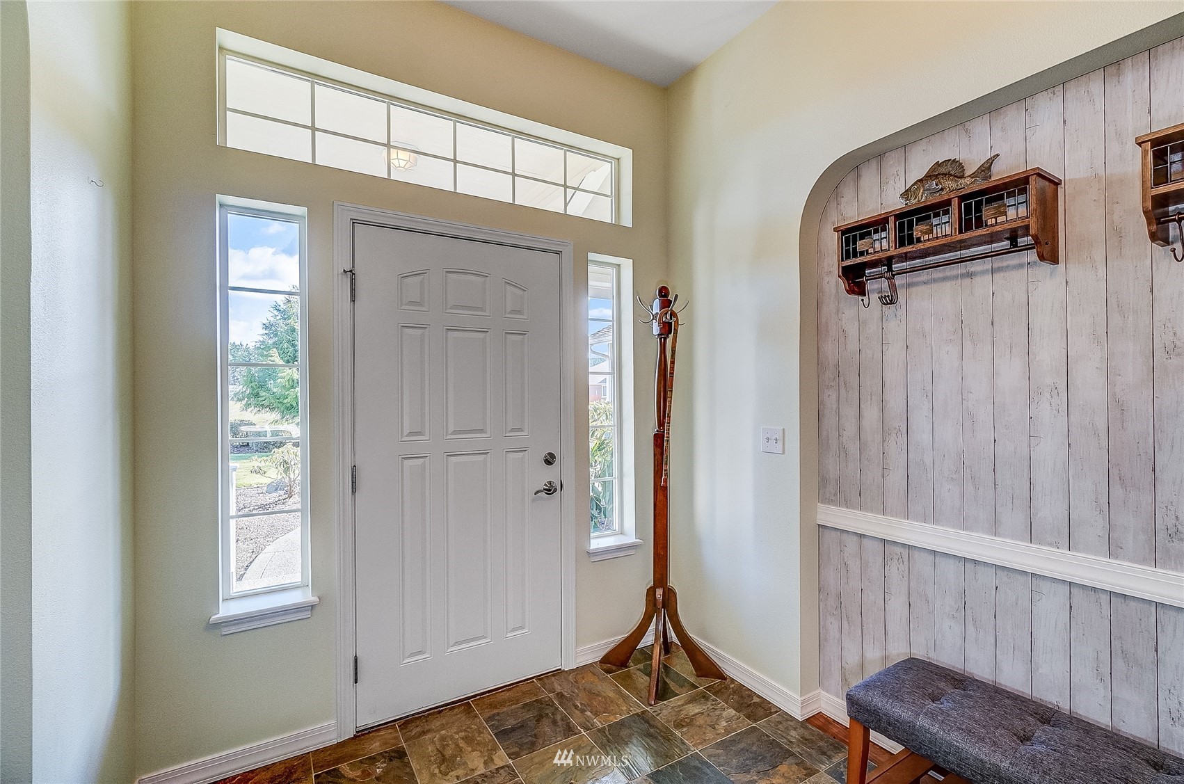 18039 Wild Violet Lane Southwest Rochester, WA 98579 - Photo 3 of 40 a view of a livingroom with windows