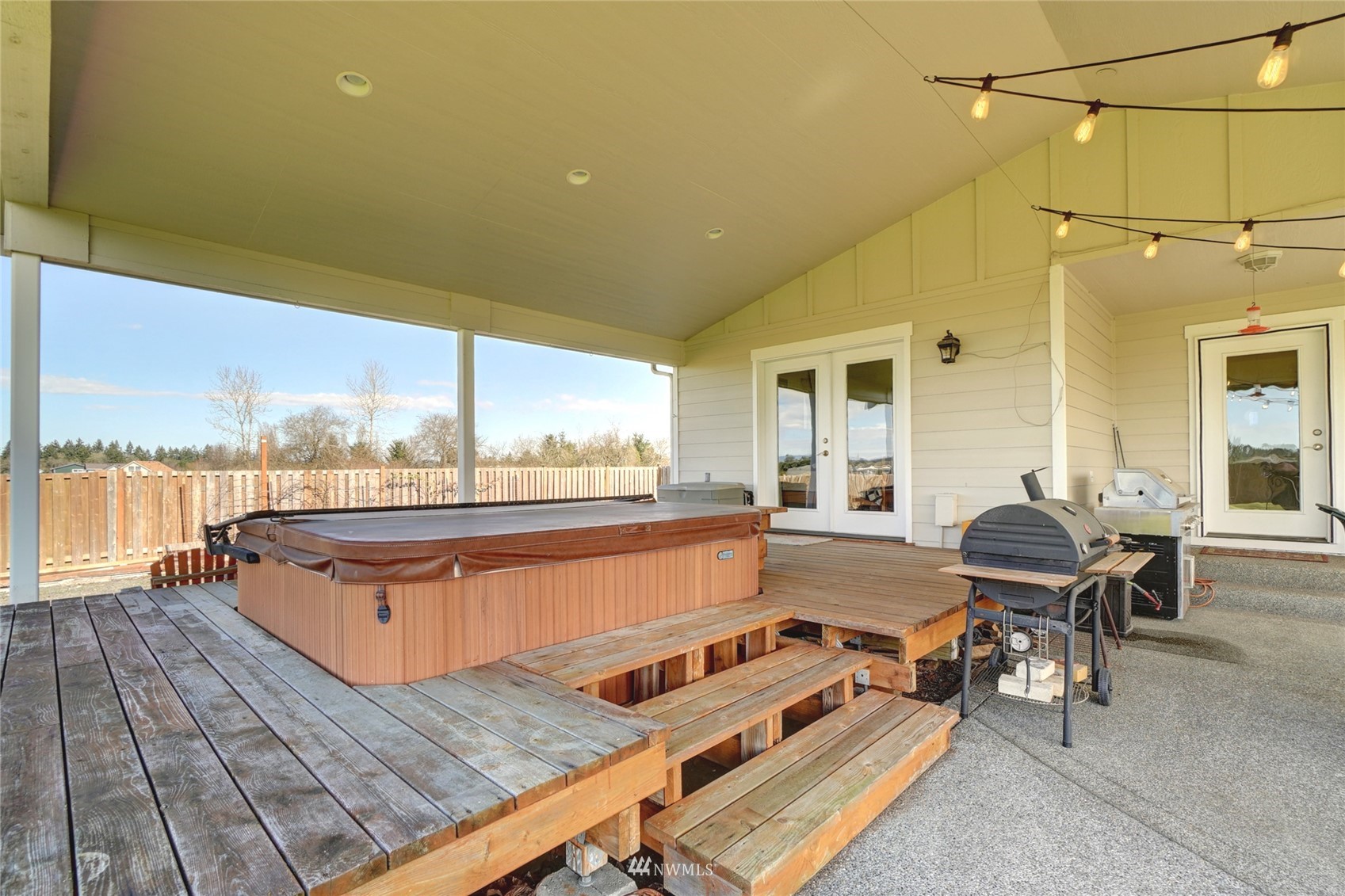 18039 Wild Violet Lane Southwest Rochester, WA 98579 - Photo 31 of 40 a balcony with furniture and outdoor view
