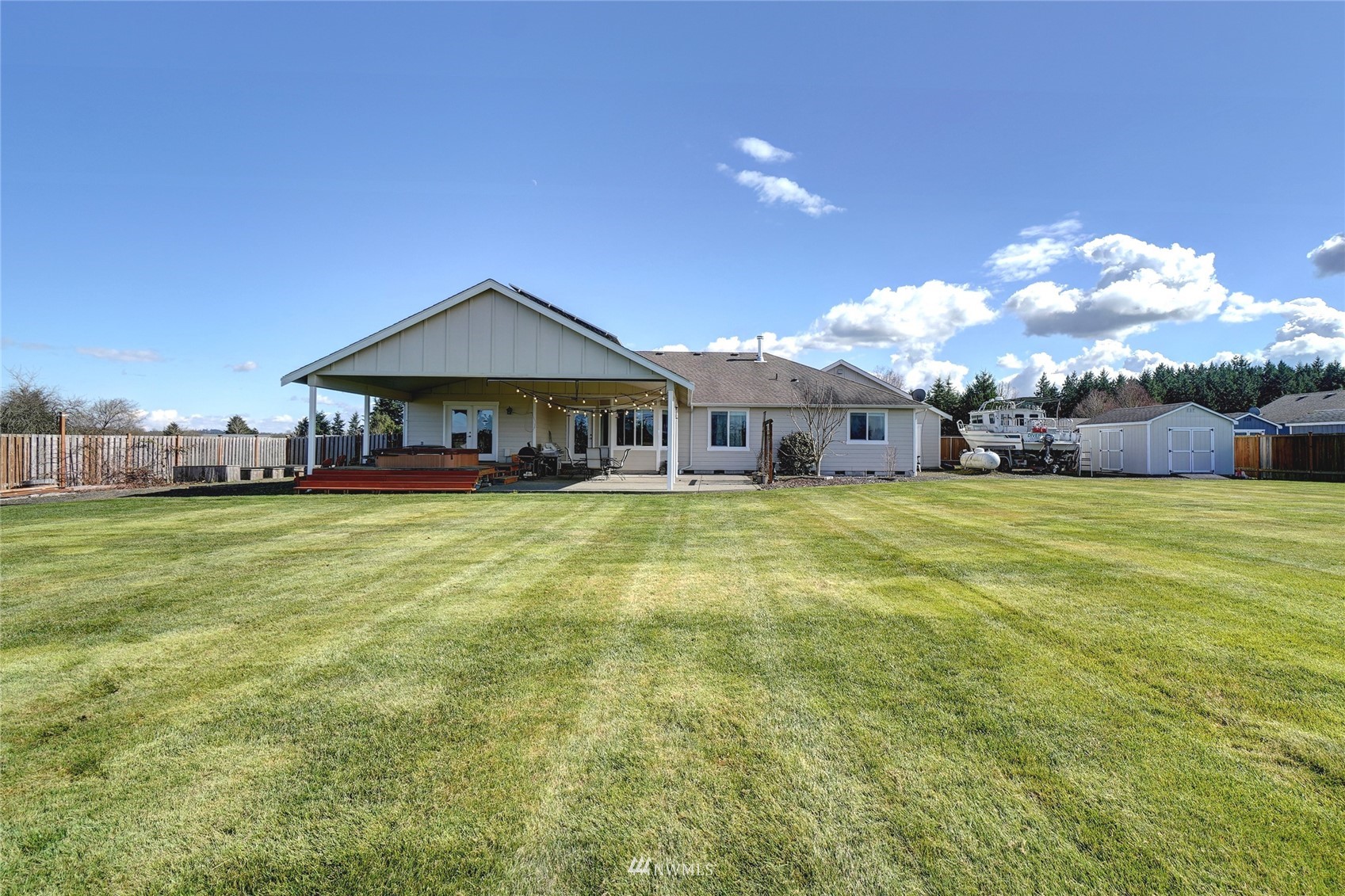 18039 Wild Violet Lane Southwest Rochester, WA 98579 - Photo 34 of 40 a view of a house with a big yard