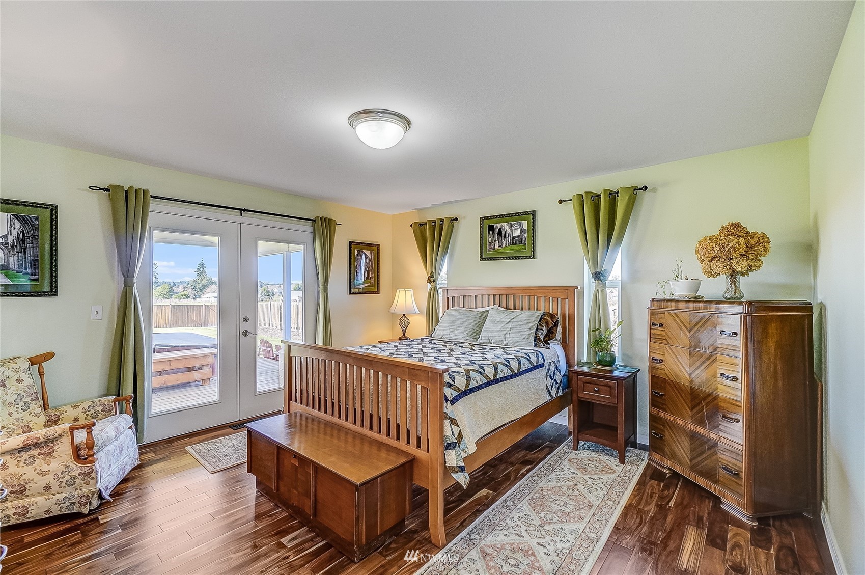 18039 Wild Violet Lane Southwest Rochester, WA 98579 - Photo 8 of 40 a bed room with a bed and a window
