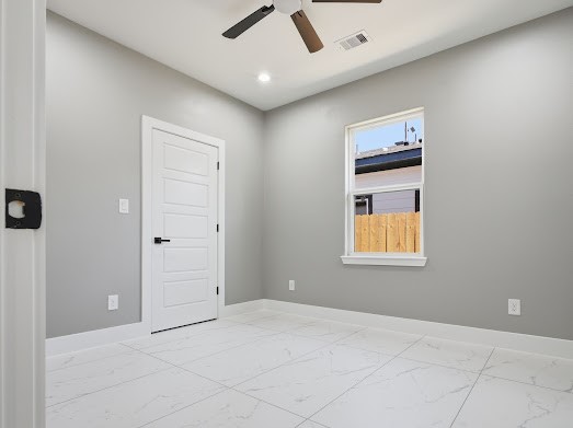 8216 Locksley Road, Unit B Houston, TX 77078 - Photo 9 of 15 an empty room with windows and closet