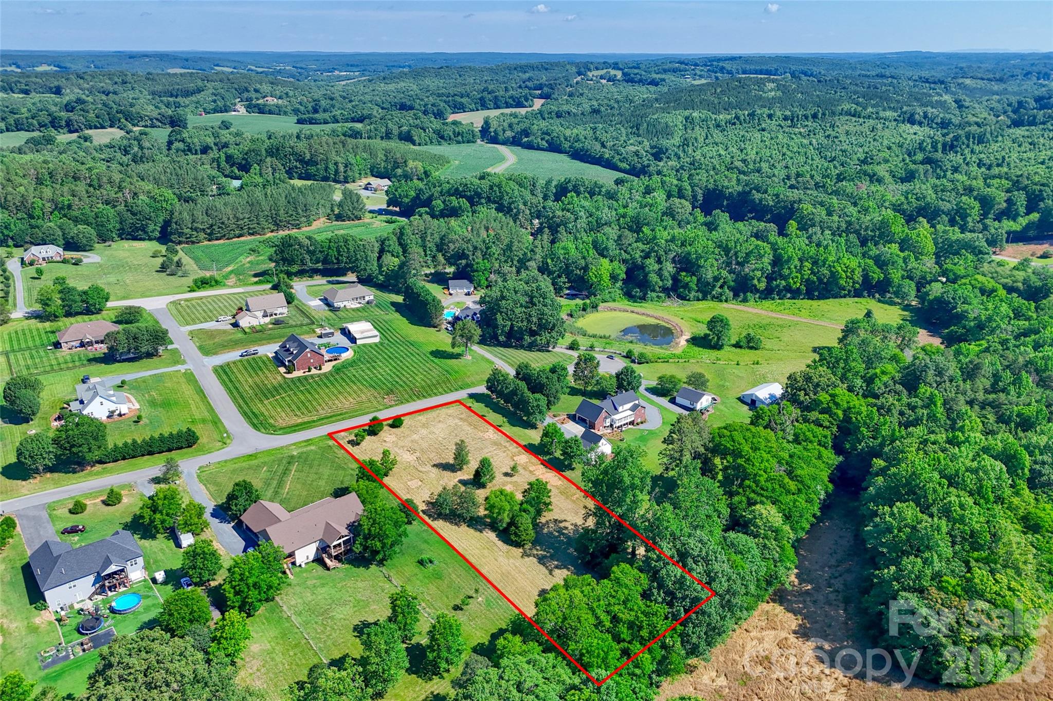 Lot 3 Crepts Branch Road, Unit 3 Locust, NC 28097 - Photo 27 of 36 a view of a play ground with a lot of flower plants
