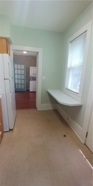 3205 Guadalupe Street, Unit A Austin, TX 78705 - Photo 5 of 17 an empty room with windows