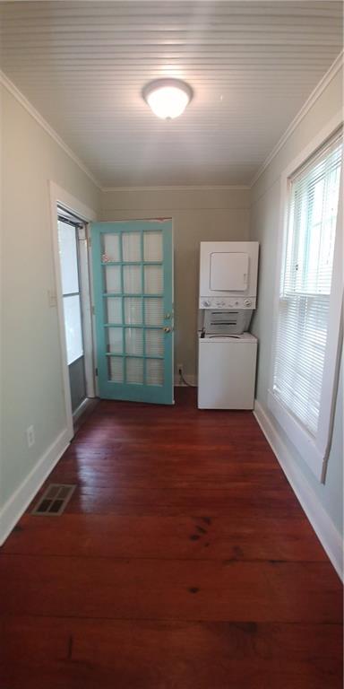 3205 Guadalupe Street, Unit A Austin, TX 78705 - Photo 6 of 17 an empty room with windows and cabinet
