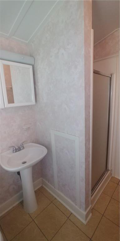 3205 Guadalupe Street, Unit A Austin, TX 78705 - Photo 10 of 17 a bathroom with a sink a toilet and mirror