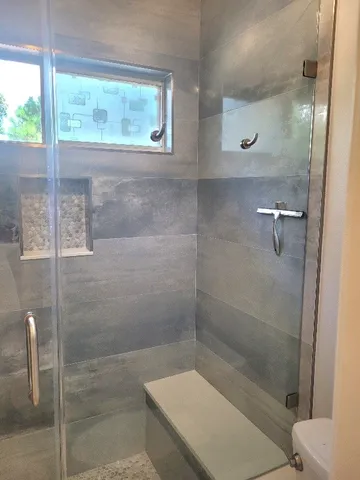 en empty room with windows