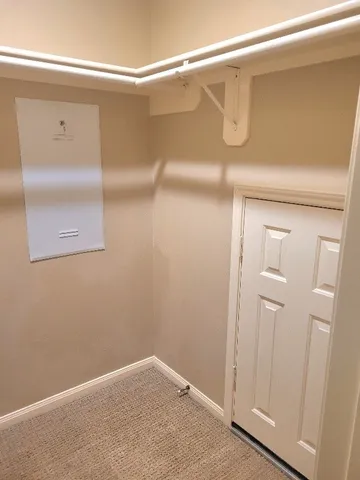 a view of small space with racks on the wall