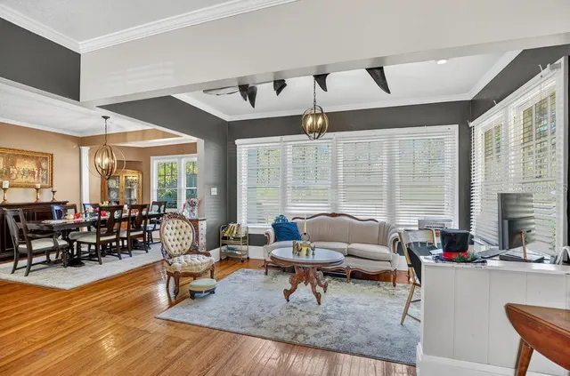 a view of a dining room with furniture window and outside view