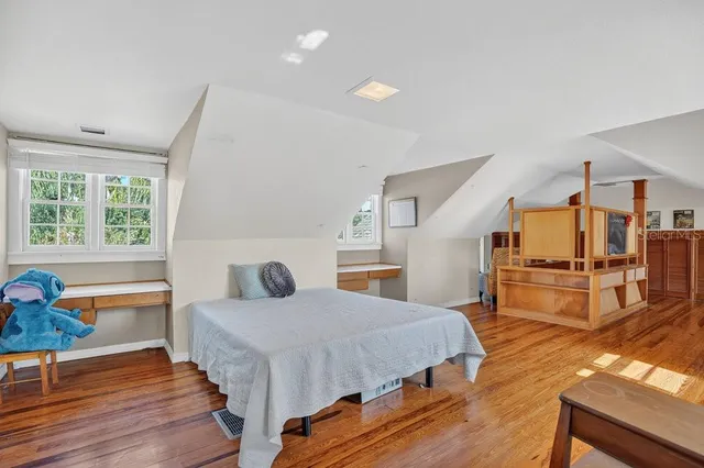 a view of a backyard with swimming pool