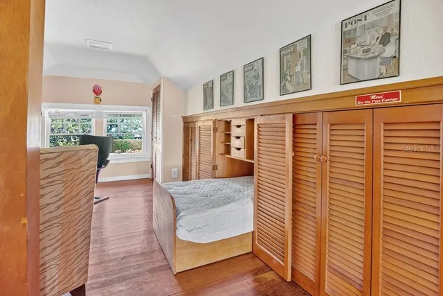 a view of a patio with table and chairs