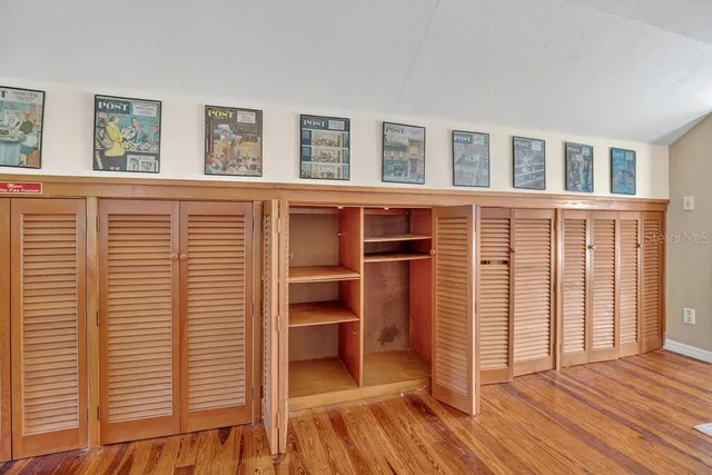 a view of backyard with a table and chairs